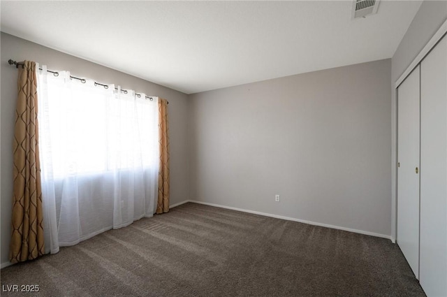 5204 Padua Way, Las Vegas, NV 89107 - carpeted empty room featuring baseboards