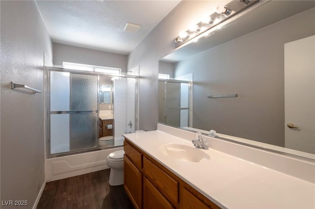 5204 Padua Way, Las Vegas, NV 89107 - full bath with vanity, wood finished floors, and bath / shower combo with glass door