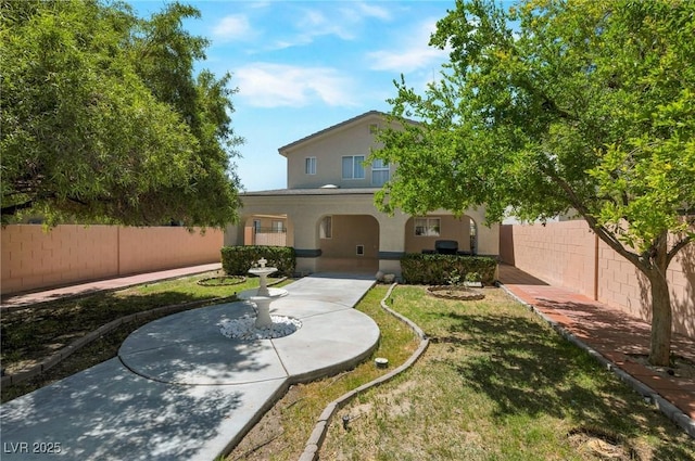 5204 Padua Way, Las Vegas, NV 89107 - back of property featuring stucco siding and a fenced backyard