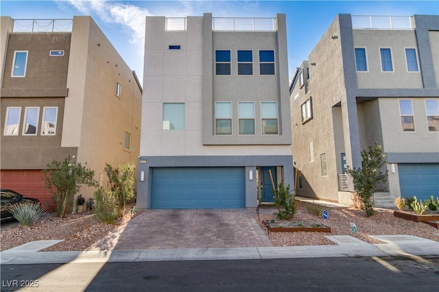 8089 Misty Canyon Ave, Las Vegas, NV 89113 - view of front of house featuring stucco siding, a garage, and driveway
