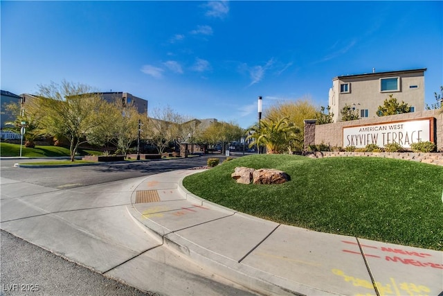 8089 Misty Canyon Ave, Las Vegas, NV 89113 - view of community with a lawn