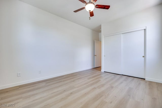 5013 Diamond Ranch Ave, Las Vegas, NV 89131 - unfurnished bedroom featuring light wood-style floors, a closet, and a ceiling fan