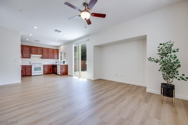 5013 Diamond Ranch Ave, Las Vegas, NV 89131 - unfurnished living room with light wood finished floors, ceiling fan, and recessed lighting