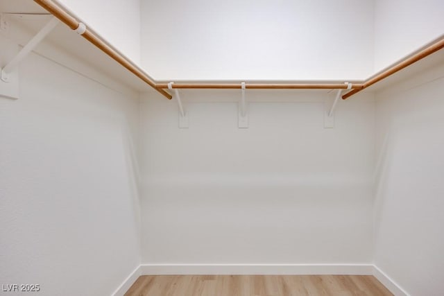 5013 Diamond Ranch Ave, Las Vegas, NV 89131 - spacious closet with light wood-style floors