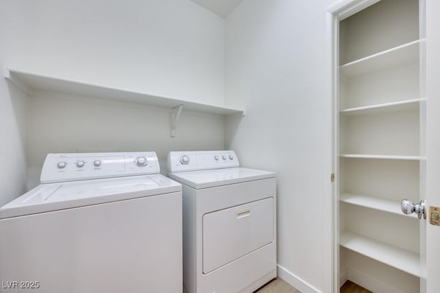 5013 Diamond Ranch Ave, Las Vegas, NV 89131 - washroom featuring washing machine and dryer and baseboards