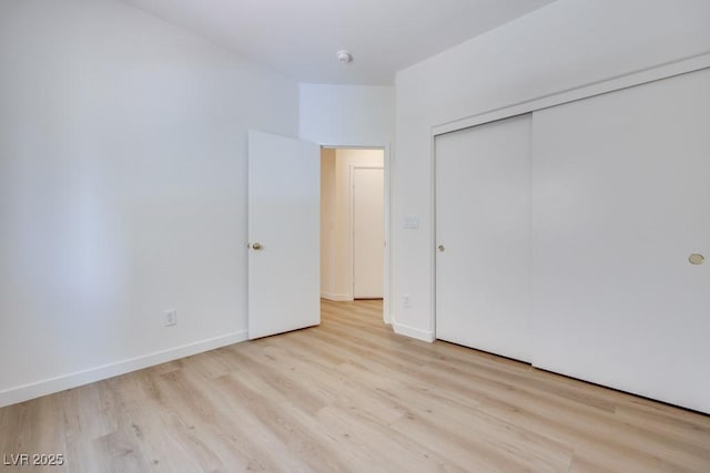 5013 Diamond Ranch Ave, Las Vegas, NV 89131 - unfurnished bedroom featuring wood finished floors and a closet