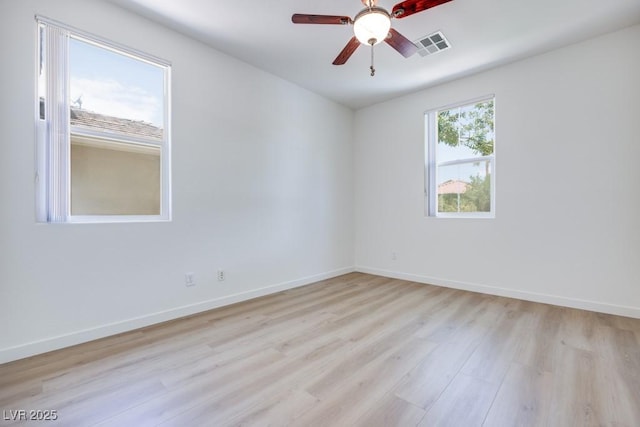 5013 Diamond Ranch Ave, Las Vegas, NV 89131 - spare room with light wood finished floors and a ceiling fan