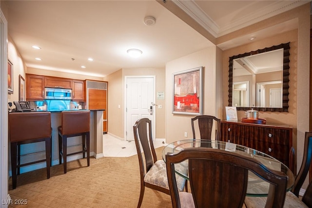 135 E Harmon Ave Unit 414, Las Vegas, NV 89109 - dining space with crown molding and recessed lighting