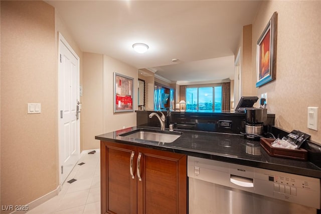 135 E Harmon Ave Unit 414, Las Vegas, NV 89109 - kitchen with stainless steel dishwasher and brown cabinets