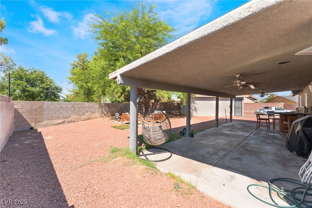 170 Palisade Ave, Las Vegas, NV 89110 - fenced backyard featuring a patio, an outdoor structure, and ceiling fan