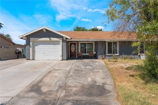 170 Palisade Ave, Las Vegas, NV 89110 - single story home featuring a garage, stucco siding, concrete driveway, and covered porch