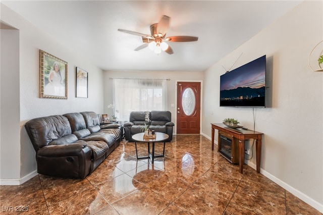 170 Palisade Ave, Las Vegas, NV 89110 - living room with a ceiling fan and baseboards
