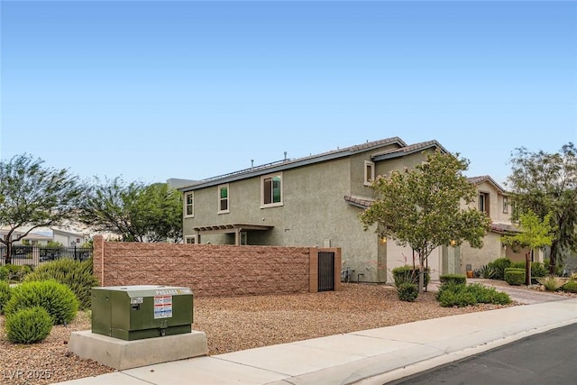 1009 Bluebell Brook St, Henderson, NV 89052 - view of home's exterior featuring stucco siding