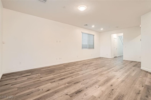 1009 Bluebell Brook St, Henderson, NV 89052 - unfurnished room with light wood-style floors and recessed lighting