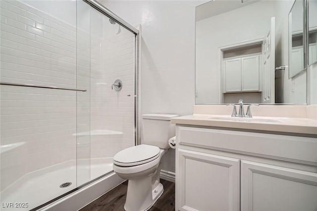 1009 Bluebell Brook St, Henderson, NV 89052 - full bathroom with wood finished floors, a shower stall, and vanity