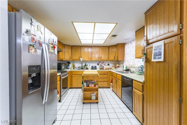 744 Milstead Ct, Las Vegas, NV 89110 - kitchen featuring appliances with stainless steel finishes, light countertops, light tile patterned flooring, brown cabinetry, and open shelves