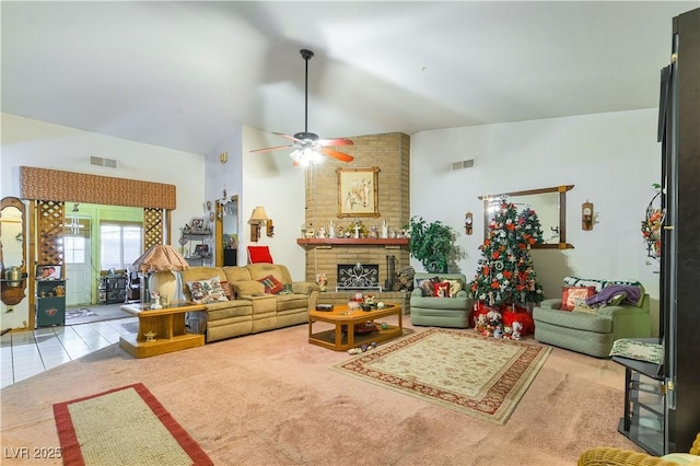 744 Milstead Ct, Las Vegas, NV 89110 - living room featuring lofted ceiling, ceiling fan, carpet floors, and a brick fireplace