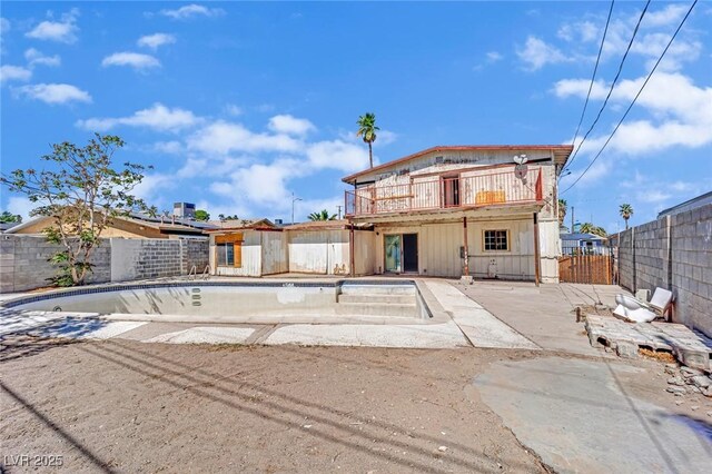 3009 Merritt Ave, Las Vegas, NV 89102 - rear view of property with a fenced backyard and a patio area
