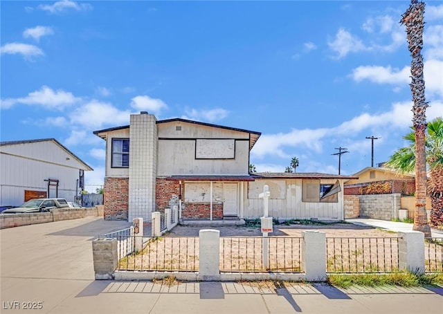3009 Merritt Ave, Las Vegas, NV 89102 - back of house with a fenced front yard and brick siding