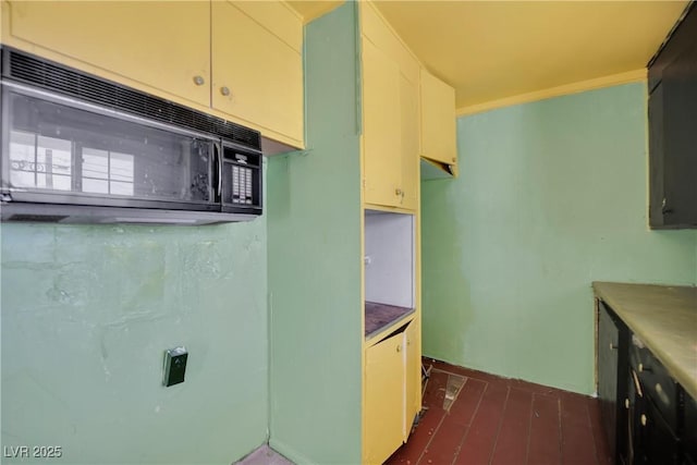 3009 Merritt Ave, Las Vegas, NV 89102 - kitchen with black microwave