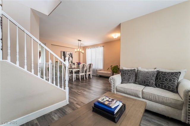 1014 Lone Pine River Ave, Henderson, NV 89002 - living room featuring a chandelier, wood finished floors, and stairs