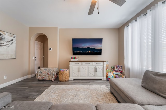 1014 Lone Pine River Ave, Henderson, NV 89002 - living room with wood finished floors, ceiling fan, and arched walkways