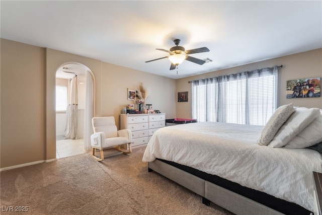 1014 Lone Pine River Ave, Henderson, NV 89002 - bedroom featuring arched walkways, carpet flooring, and a ceiling fan
