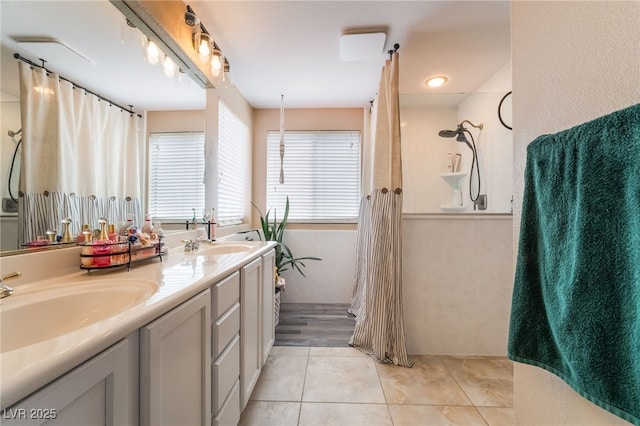 1014 Lone Pine River Ave, Henderson, NV 89002 - bathroom featuring double vanity, a shower with curtain, and tile patterned flooring