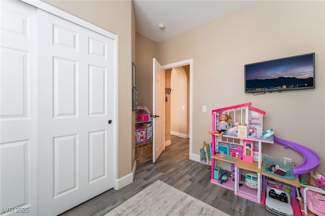 1014 Lone Pine River Ave, Henderson, NV 89002 - rec room with wood finished floors and arched walkways