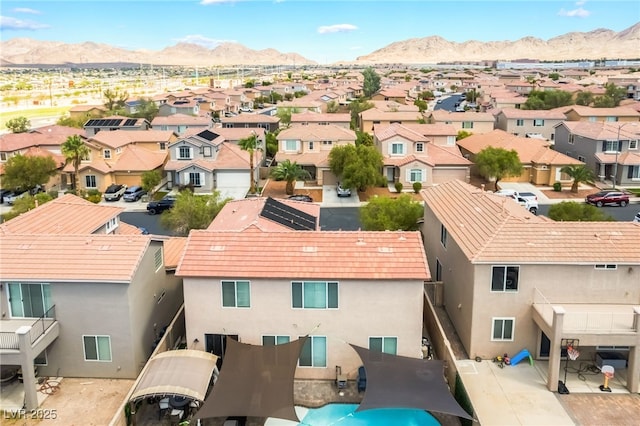 1014 Lone Pine River Ave, Henderson, NV 89002 - aerial perspective of suburban area featuring a mountainous background