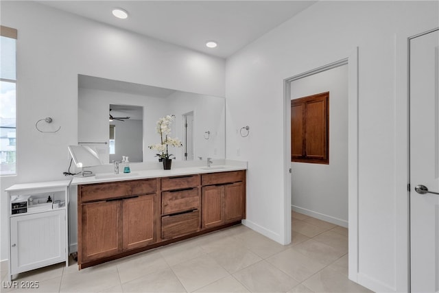 1309 Azure Jay Ave, North Las Vegas, NV 89084 - full bathroom featuring double vanity, ceiling fan, and tile patterned floors