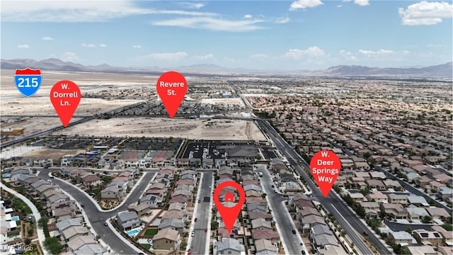 1309 Azure Jay Ave, North Las Vegas, NV 89084 - aerial perspective of suburban area featuring a mountainous background