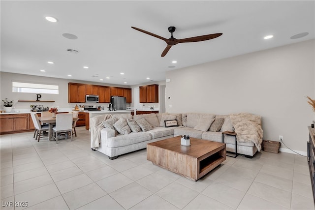 1309 Azure Jay Ave, North Las Vegas, NV 89084 - living room featuring ceiling fan, recessed lighting, and light tile patterned floors