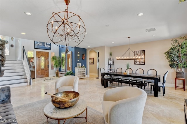 10960 Bethel Park Ct, Las Vegas, NV 89141 - living area featuring a chandelier, recessed lighting, stairs, arched walkways, and light tile patterned floors