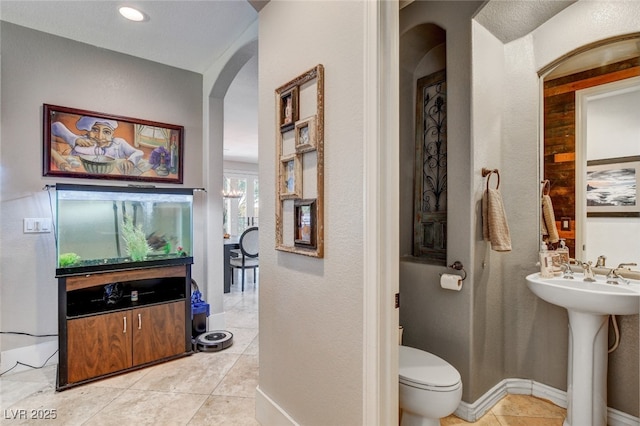 10960 Bethel Park Ct, Las Vegas, NV 89141 - bathroom featuring tile patterned floors and a textured wall