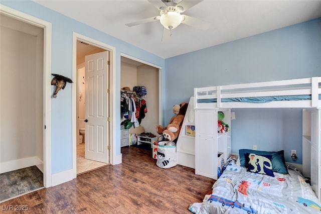 10960 Bethel Park Ct, Las Vegas, NV 89141 - bedroom with wood finished floors, a closet, and a ceiling fan