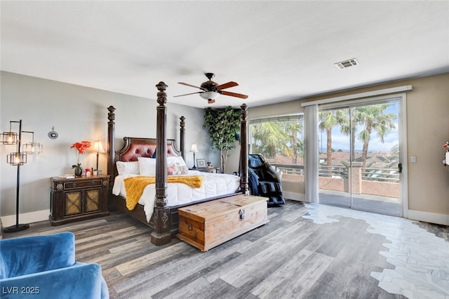 10960 Bethel Park Ct, Las Vegas, NV 89141 - bedroom featuring access to exterior and wood finished floors