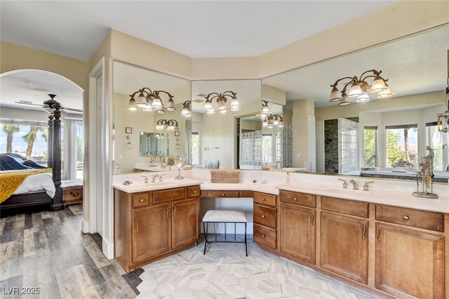 10960 Bethel Park Ct, Las Vegas, NV 89141 - ensuite bathroom with double vanity and ceiling fan