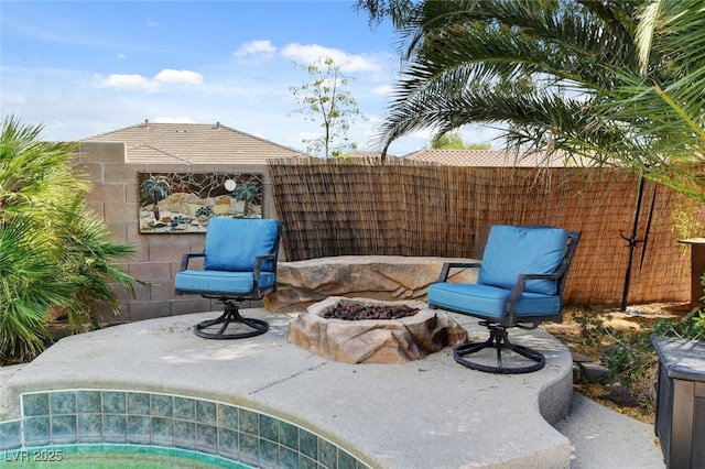 10960 Bethel Park Ct, Las Vegas, NV 89141 - view of patio featuring a fire pit