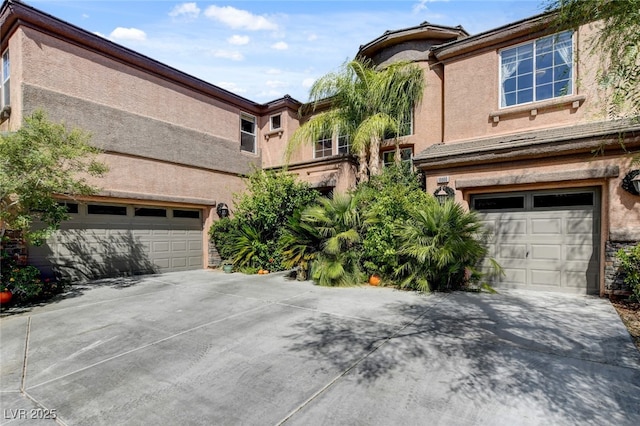 10960 Bethel Park Ct, Las Vegas, NV 89141 - view of front of home with driveway, stucco siding, and an attached garage