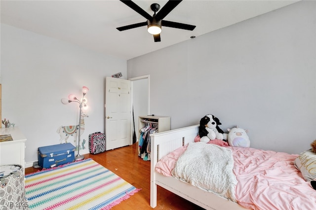 10960 Bethel Park Ct, Las Vegas, NV 89141 - bedroom with wood finished floors and ceiling fan