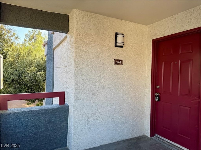 8600 W Charleston Blvd Unit 2161, Las Vegas, NV 89117 - view of exterior entry featuring stucco siding