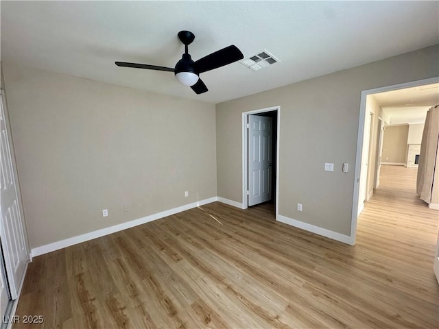 8600 W Charleston Blvd Unit 2161, Las Vegas, NV 89117 - unfurnished bedroom with light wood-style flooring and a ceiling fan