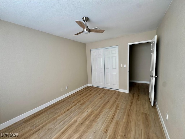 8600 W Charleston Blvd Unit 2161, Las Vegas, NV 89117 - unfurnished bedroom featuring light wood-style flooring, a closet, and ceiling fan