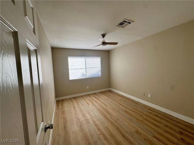 8600 W Charleston Blvd Unit 2161, Las Vegas, NV 89117 - empty room with light wood-type flooring and ceiling fan