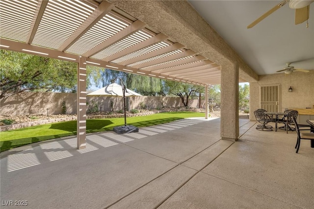 2559 Deora Way, Henderson, NV 89052 - fenced backyard with a ceiling fan, a pergola, and a patio