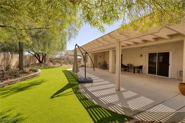 2559 Deora Way, Henderson, NV 89052 - view of yard featuring a pergola, a patio, and ceiling fan