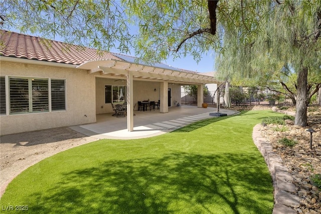 2559 Deora Way, Henderson, NV 89052 - fenced backyard with a pergola and a patio area