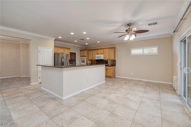 2559 Deora Way, Henderson, NV 89052 - kitchen with white appliances, ceiling fan, a kitchen island with sink, ornamental molding, and light tile patterned floors