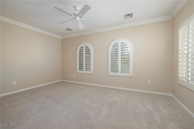 2559 Deora Way, Henderson, NV 89052 - spare room with ornamental molding, a ceiling fan, and light colored carpet